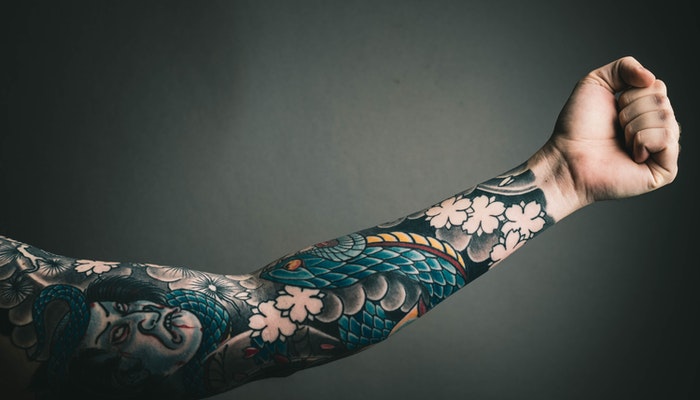 Tattoo Peeling: Treatment and Minimizing | Saniderm